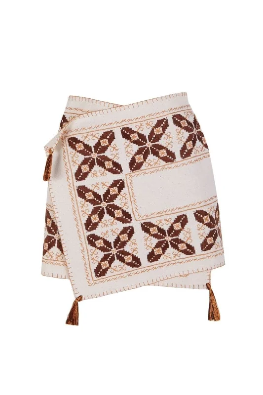 CROSS-SKIRT WITH HAND EMBROIDERY ruffled skirt detail
